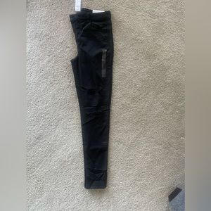High waisted. Black skinny jean with rips. Size 12 XLong
